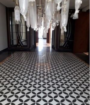 flooring in cremo delicato and black marquina